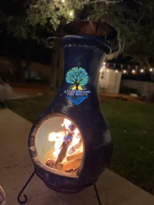 Photo of AGMTS firewood burning in a chiminea fireplace in Austin, TX